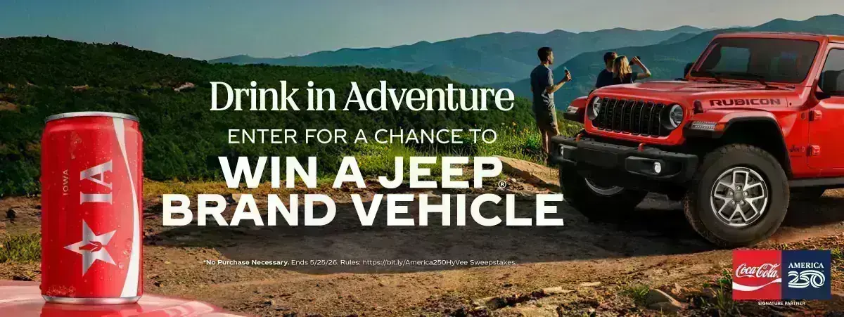 Coca-Cola America 250 Hy-Vee Sweepstakes banner featuring a can of Coca-Cola and a red Jeep with text promoting a chance to win a Jeep brand vehicle.